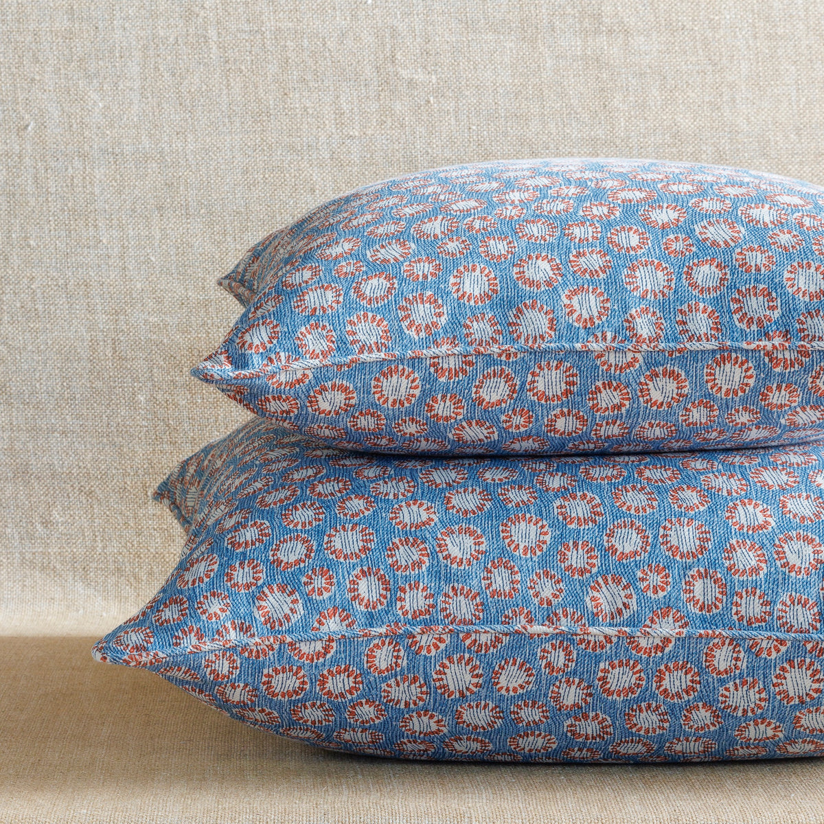 Square Cushion in Blue and Red Coral